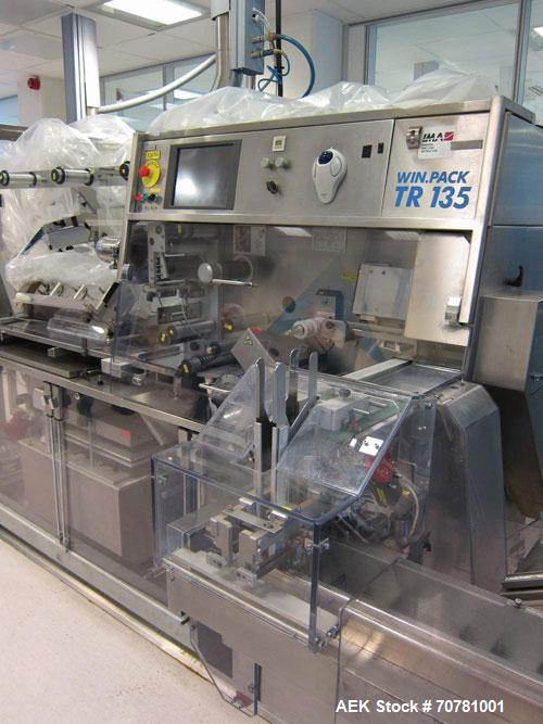 Used IMA TR-135 blister packaging line consisting of the following: IMA model TR-135 blister packaging machine. Has blister size range (Width) 30mm-88mm x (Length) 60mm-135mm x (Depth) 3mm-12mm. Spee...