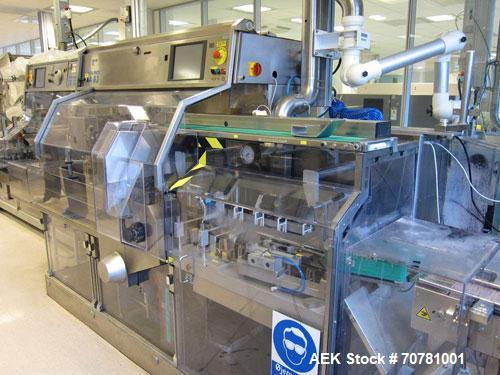 Used IMA TR-135 blister packaging line consisting of the following: IMA model TR-135 blister packaging machine. Has blister size range (Width) 30mm-88mm x (Length) 60mm-135mm x (Depth) 3mm-12mm. Spee...