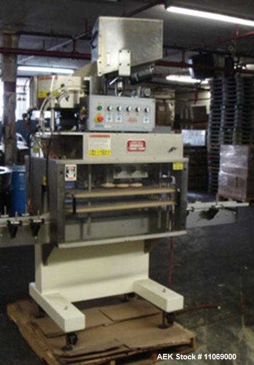 Used Complete Powder Filling Line. Includes the following equipment:48" diameter accumulating table, AMS model A-100 auger filler with conveyor, Kaps-All model A-6 6 spindle capper, CVC model 310C wr...