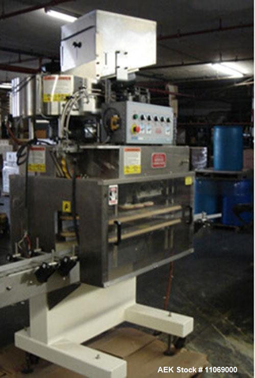Used Complete Powder Filling Line. Includes the following equipment:48" diameter accumulating table, AMS model A-100 auger filler with conveyor, Kaps-All model A-6 6 spindle capper, CVC model 310C wr...