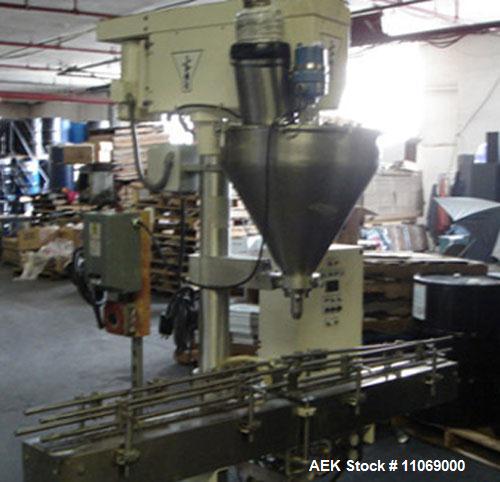 Used Complete Powder Filling Line. Includes the following equipment:48" diameter accumulating table, AMS model A-100 auger filler with conveyor, Kaps-All model A-6 6 spindle capper, CVC model 310C wr...