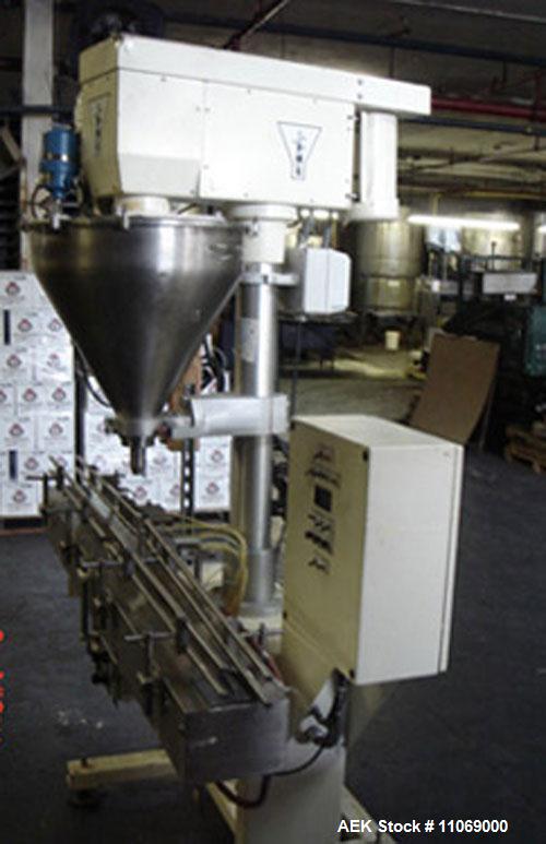 Used Complete Powder Filling Line. Includes the following equipment:48" diameter accumulating table, AMS model A-100 auger filler with conveyor, Kaps-All model A-6 6 spindle capper, CVC model 310C wr...