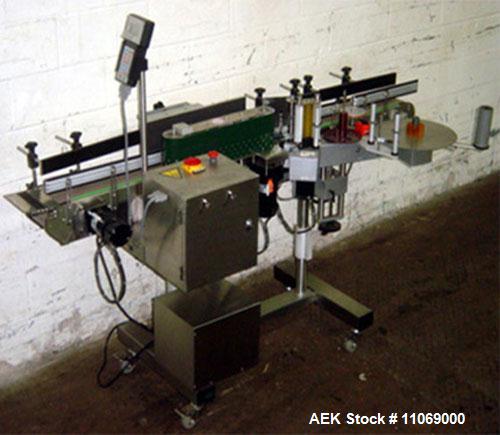 Used Complete Powder Filling Line. Includes the following equipment:48" diameter accumulating table, AMS model A-100 auger filler with conveyor, Kaps-All model A-6 6 spindle capper, CVC model 310C wr...