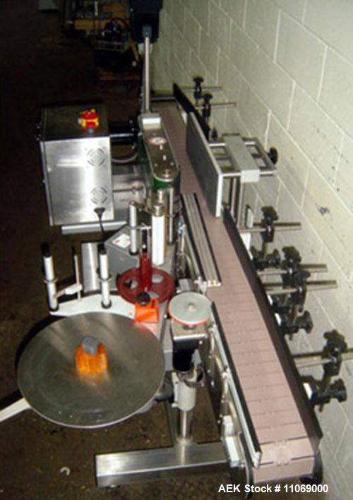 Used Complete Powder Filling Line. Includes the following equipment:48" diameter accumulating table, AMS model A-100 auger filler with conveyor, Kaps-All model A-6 6 spindle capper, CVC model 310C wr...