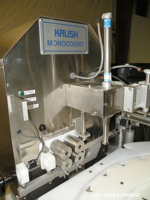 Used Kalish Swiftpack Monocount Tablet/Capsule Filling Line, approximately 60 bottles per minute, consisting of: (1) Kalish 24’’ diameter accumulating table, model 7546, stainless steel construction,...