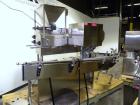 Used Kalish Swiftpack Monocount Tablet/Capsule Filling Line, approximately 60 bottles per minute, consisting of: (1) Kalish 24’’ diameter accumulating table, model 7546, stainless steel construction,...