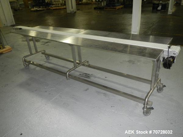 Used Pack off conveyor, 6" wide x 11' long slat conveyor, 12" stainless steel side extensions, .13 hp dc motor drive on stands.