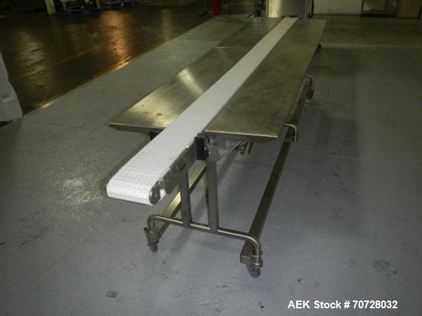 Used Pack off conveyor, 6" wide x 11' long slat conveyor, 12" stainless steel side extensions, .13 hp dc motor drive on stands.