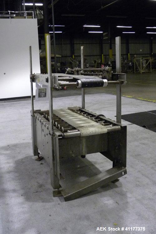 Used ABC Packaging Compression Section Powered Roller Conveyor, Model 47. Top belt 8" wide x 44" long, bottom driven belt 10" wide x 44" long. Driven by a 3/4 hp, 3/60/230/460 volt, 1740 rpm gearmoto...