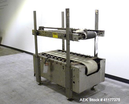 Used ABC Packaging Compression Section Powered Roller Conveyor, Model 47. Top belt 8" wide x 44" long, bottom driven belt 10" wide x 44" long. Driven by a 3/4 hp, 3/60/230/460 volt, 1740 rpm gearmoto...