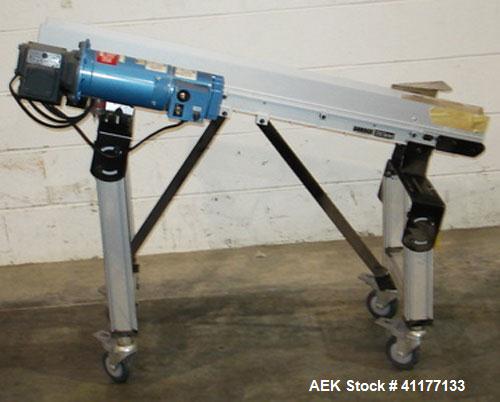 Used Dorner Belt Conveyor, 2100 Series, Model 696499. 3-3/4" wide x 48" long cleated belt. Cleats are 1-1/4" tall and has 5-3/4" between each cleat. Driven by a 1/3 hp gear motor. Mounted on legs wit...