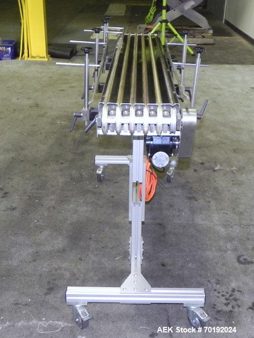Used Dorner Portable Conveyor with Eagle belting. Unit is 5' long x 8" wide and has (6) Eagle belts. Driven by a 1/8 hp, 130 volt DC gear motor with speed controller. Machine footprint 62" long x 22"...