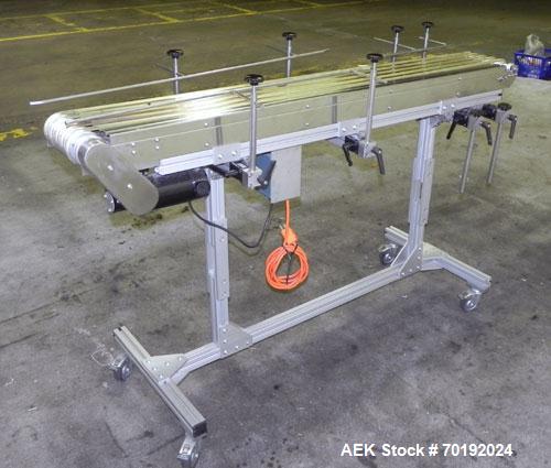 Used Dorner Portable Conveyor with Eagle belting. Unit is 5' long x 8" wide and has (6) Eagle belts. Driven by a 1/8 hp, 130 volt DC gear motor with speed controller. Machine footprint 62" long x 22"...