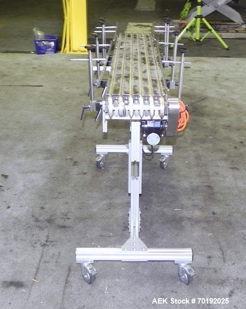 Used Dorner Portable Conveyor with Eagle belting. Unit is 5' long x 8" wide and has (6) Eagle belts. Driven by a 1/8 hp, 130 volt DC gear motor with speed controller. Machine footprint 62" long x 22"...
