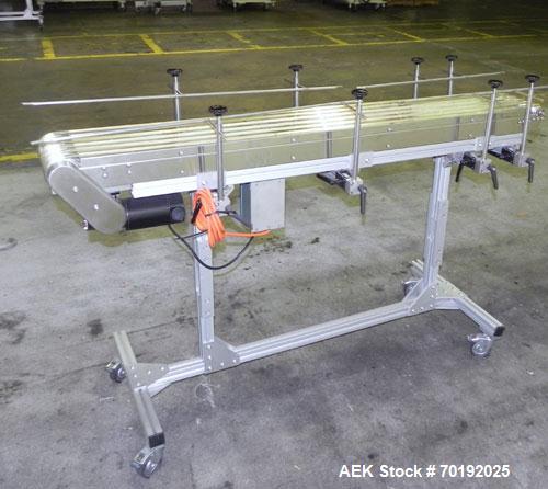 Used Dorner Portable Conveyor with Eagle belting. Unit is 5' long x 8" wide and has (6) Eagle belts. Driven by a 1/8 hp, 130 volt DC gear motor with speed controller. Machine footprint 62" long x 22"...