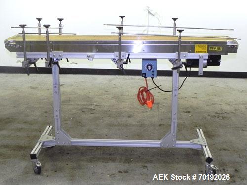 Used Dorner Portable Conveyor with Eagle belting. Unit is 5' long x 8" wide and has (6) Eagle belts. Driven by a 1/8 hp, 130 volt DC gear motor with ac-dc speed controller. Machine footprint 62" long...