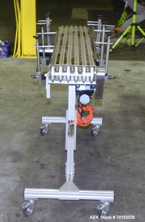 Used Dorner Portable Conveyor with Eagle belting. Unit is 5' long x 8" wide and has (6) Eagle belts. Driven by a 1/8 hp, 130 volt DC gear motor with ac-dc speed controller. Machine footprint 62" long...