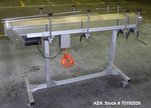 Used Dorner Portable Conveyor with Eagle belting. Unit is 5' long x 8" wide and has (6) Eagle belts. Driven by a 1/8 hp, 130 volt DC gear motor with ac-dc speed controller. Machine footprint 62" long...
