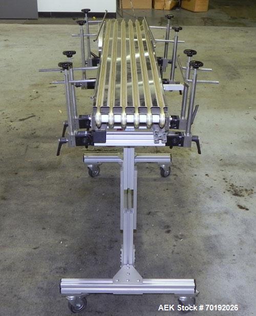 Used Dorner Portable Conveyor with Eagle belting. Unit is 5' long x 8" wide and has (6) Eagle belts. Driven by a 1/8 hp, 130 volt DC gear motor with ac-dc speed controller. Machine footprint 62" long...