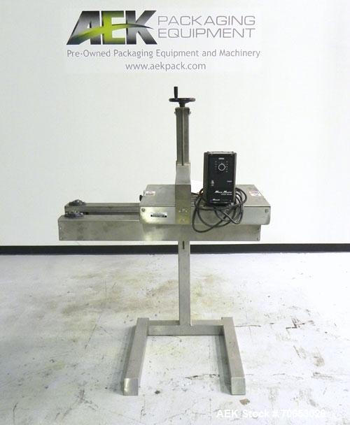 Used Garvey Model 1550 Side Belt Transfer Conveyor. Has Motor Master 20000 variable speed drive. Machine is of stainless steel construction. Has spare conveyor head. 1/3/110V.