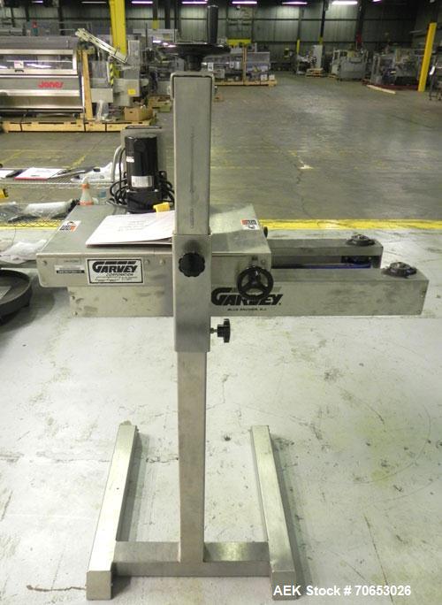 Used Garvey Model 1550 Side Belt Transfer Conveyor. Has Motor Master 20000 variable speed drive. Machine is of stainless steel construction. Has spare conveyor head. 1/3/110V.