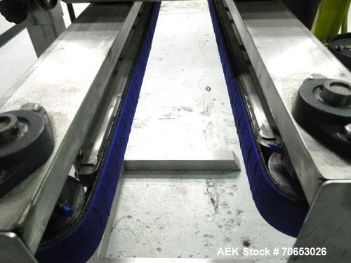 Used Garvey Model 1550 Side Belt Transfer Conveyor. Has Motor Master 20000 variable speed drive. Machine is of stainless steel construction. Has spare conveyor head. 1/3/110V.