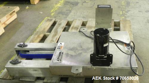 Used Garvey Model 1550 Side Belt Transfer Conveyor. Has Motor Master 20000 variable speed drive. Machine is of stainless steel construction. Has spare conveyor head. 1/3/110V.