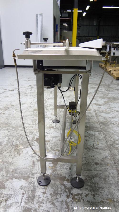 Used Garvey Dorner Model 653M Table Top Belt Conveyor. Has a VEM Motors 1370 rpm drive. Mounted on a stainless steel frame. Has a 5’ (long) x 8” (wide) belt. 3/50/230/400V.

.