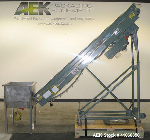 Used Hytrol Incline Belt Conveyor, Carbon Steel. Approximately 10" wide x 96" long belt with 6" long x 1-1/2" deep pockets. 84" discharge height. Driven by a 1/2 HP, 1/60/115-208/230 Volt, 1725 RPM m...