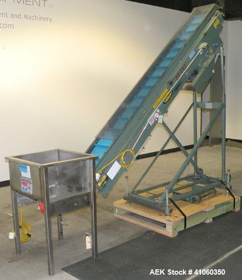 Used Hytrol Incline Belt Conveyor, Carbon Steel. Approximately 10" wide x 96" long belt with 6" long x 1-1/2" deep pockets. 84" discharge height. Driven by a 1/2 HP, 1/60/115-208/230 Volt, 1725 RPM m...