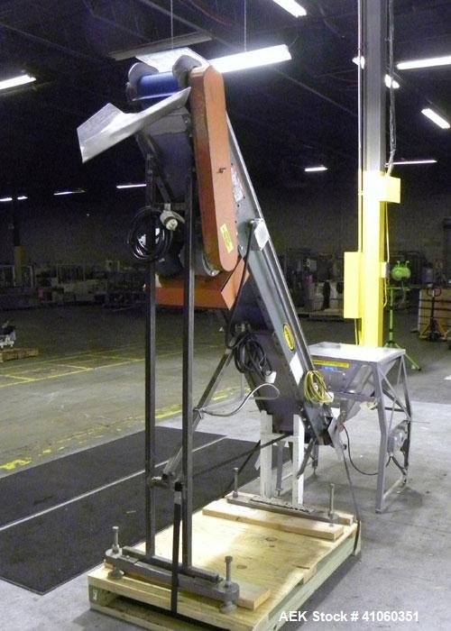 Used Hytrol Incline Belt Conveyor. Approximately 8" wide x 96" long neoprene belt6" cleat centers, 2" cleat ht, 4" statinless steel side walls.84" discharge height. Driven by a 1/2hp, 1/60/115-208/23...