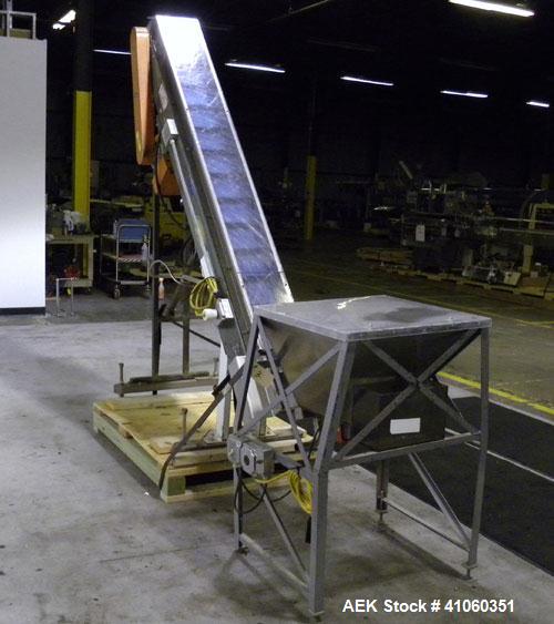 Used Hytrol Incline Belt Conveyor. Approximately 8" wide x 96" long neoprene belt6" cleat centers, 2" cleat ht, 4" statinless steel side walls.84" discharge height. Driven by a 1/2hp, 1/60/115-208/23...