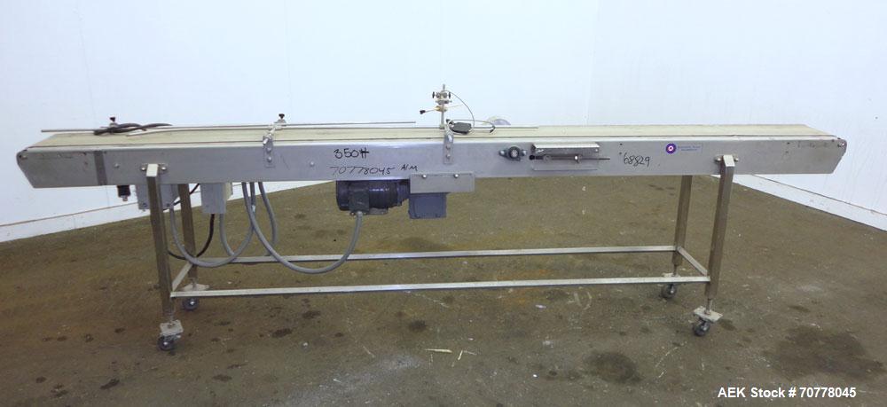 Used Johnson Nash Belt conveyor approximately 8" wide x 130" long belt. Stainless steel frame on casters with Leeson variable speed controller.