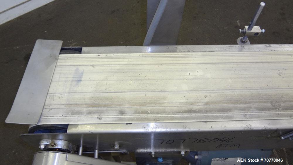 Used Johnson Nash Metal Products Belt Conveyor. Approximately 8'L x 10"w. stainless steel frame. Mounted on adjustable height screw legs.