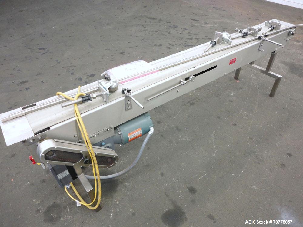 Used Johnson Nash Metal Products Belt Conveyor. Approximately 8" wide x 92" long belt. Stainless steel frame. Mounted on casters. Variable speed controller.