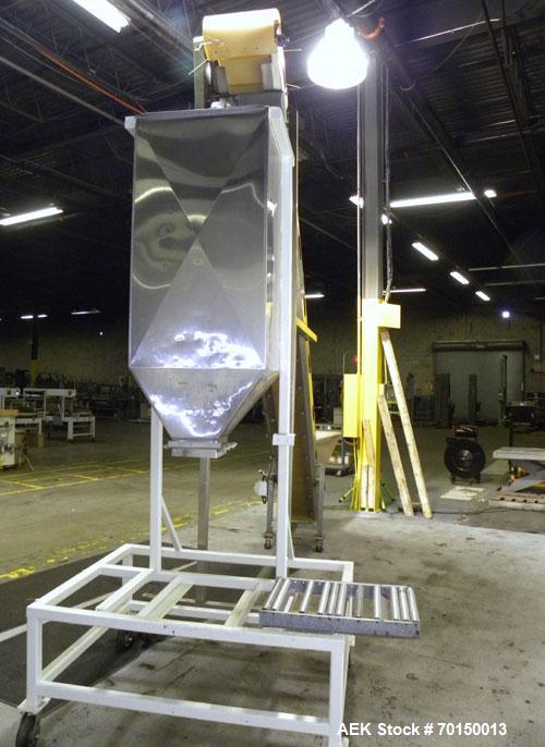Used Kamflex Inclined Belt Conveyor, Model 705. 12’’ Wide x approximately 180’’ long rubber cleated belt. 6’’ Long pockets with 3’’ tall cleats. End feed hopper. Driven by an approximate 1/2 hp, 1/60...