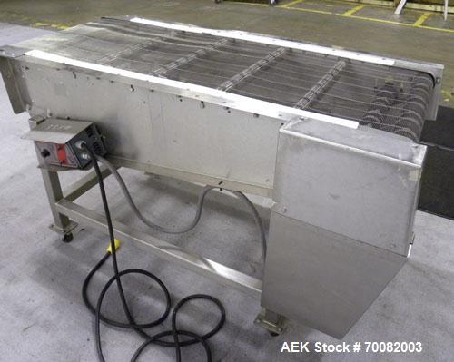 Used Wire Mesh Cooling Conveyor, 304 Stainless Steel. 22'' wide x 60'' long. Driven by a 1/2 hp, 90 volt, 1750 rpm DC gear motor, ratio 43 to 1. Includes a Bronco DC speed controller. 36'' high belt ...