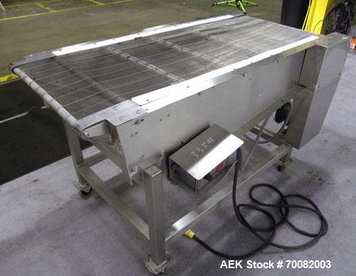 Used Wire Mesh Cooling Conveyor, 304 Stainless Steel. 22'' wide x 60'' long. Driven by a 1/2 hp, 90 volt, 1750 rpm DC gear motor, ratio 43 to 1. Includes a Bronco DC speed controller. 36'' high belt ...