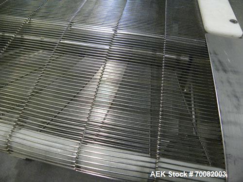 Used Wire Mesh Cooling Conveyor, 304 Stainless Steel. 22'' wide x 60'' long. Driven by a 1/2 hp, 90 volt, 1750 rpm DC gear motor, ratio 43 to 1. Includes a Bronco DC speed controller. 36'' high belt ...