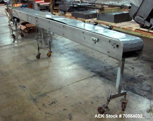 Used Table Top Chain Conveyor.Approximate 12" wide x 173" long plastic belt.Driven by a 1/2 hp, 3/60/230/460 volt, 1720 rpm motor. Mounted on a stainless steel frame with casters.