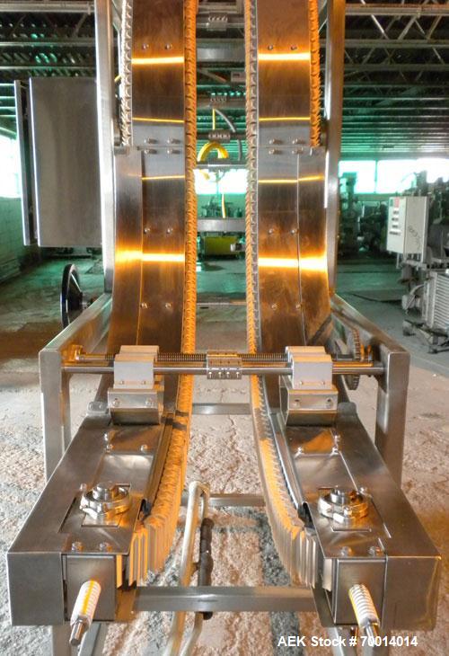Used APS (Automated Production Systems) “S” Shaped Side Belt Bottle or Case Elevator.  (2) 3-1/2’’ tall side gripper belts, bottom horizontal section approximately 36’’ long x middle incline section ...