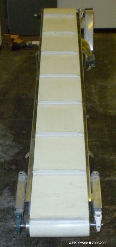 Used Inclined Belt Conveyor. 12'' wide x 92'' long rubber belt with 1'' tall cleats, spaced approximately 12'' apart. 36'' belt discharge height. Driven by a 3/4 hp, 3/60/230/460 volt, 1725 rpm gear ...