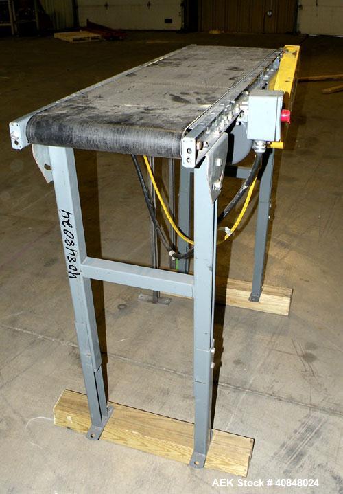 Used Rubber Belt Conveyor. 12" wide x 45" long belt, driven by a 1/3 hp, 1/60/115-208/230 volt, 1725 rpm gearmotor. Mounted on an adjustable carbon steel frame, approximate 40" discharge height.