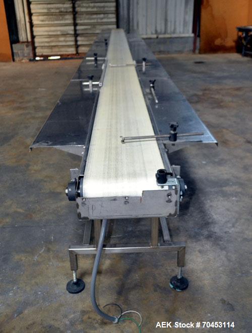 Used Belt Conveyor. Approximate 12" wide x 354" long belt. Has motor, controller, and side leaves. Mounted on a stainless steel frame. SELLING PRICE, AS IS, WHERE IS, SANFORD, NC.