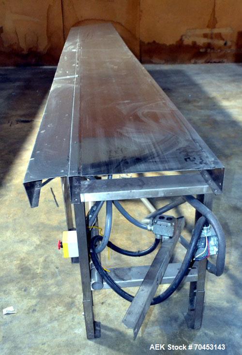 Used Belt Conveyor. Approximate 5" wide x 118" long belt. Has motor, controller, and side leaves. Mounted on a stainless steel frame. SELLING PRICE, AS IS, WHERE IS, SANFORD, NC.
