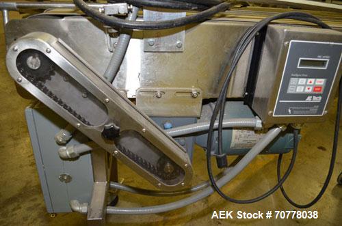 Used Johnson Nash Stainless steel belt conveyor. Approximately 10'L x 8"W. Neoprene belt, stainless steel frame mounted on casters. Has variable speed control box.