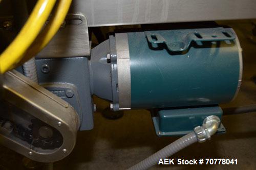 Used Neoprene belt conveyor approximately 6" wide x 120" long belt. Mounted on adjustable height screw legs.