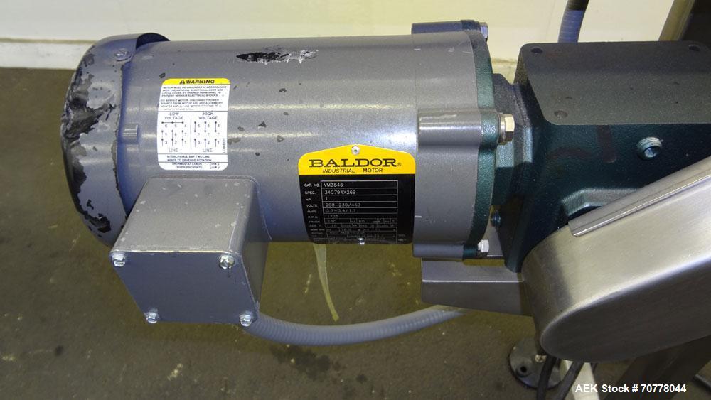 Used Belt conveyor approximately 5" wide x 120" long belt. Stainless steel frame. Adjustable height legs. Leeson variable speed controller.