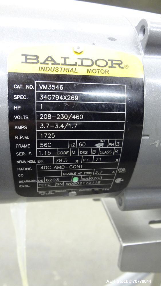 Used Belt conveyor approximately 5" wide x 120" long belt. Stainless steel frame. Adjustable height legs. Leeson variable speed controller.