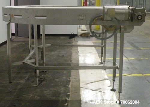 Used SSI 180 Degree U Shaped Belt Conveyor. 13-1/2" wide x 160" long plastic belt. Driven by a Baldor stainless steel washdown motor, 1 hp, 3/60/208-230/460 volt, 1740 rpm motor thru a reducer, ratio...